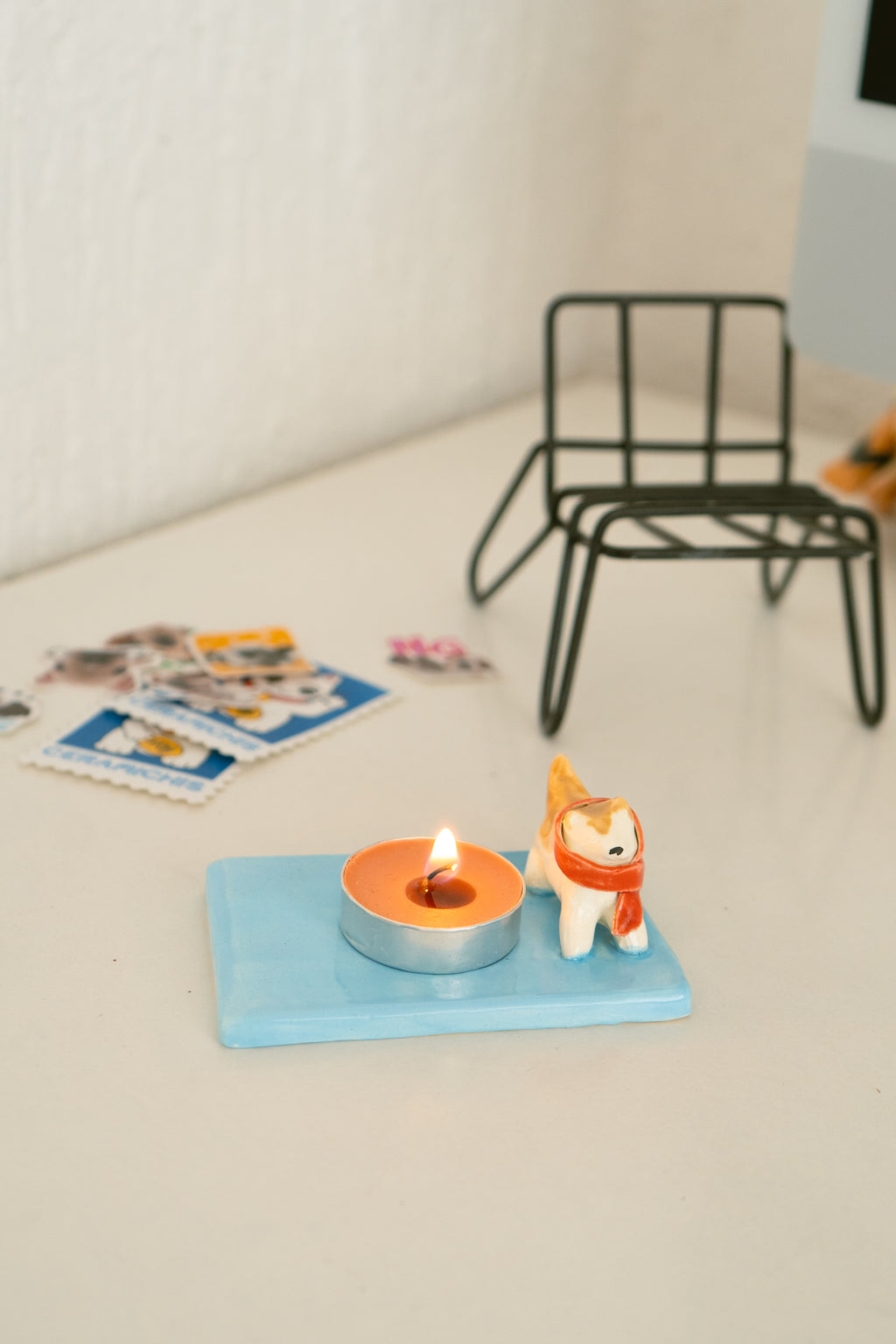 Porta vela de perrito con bufanda