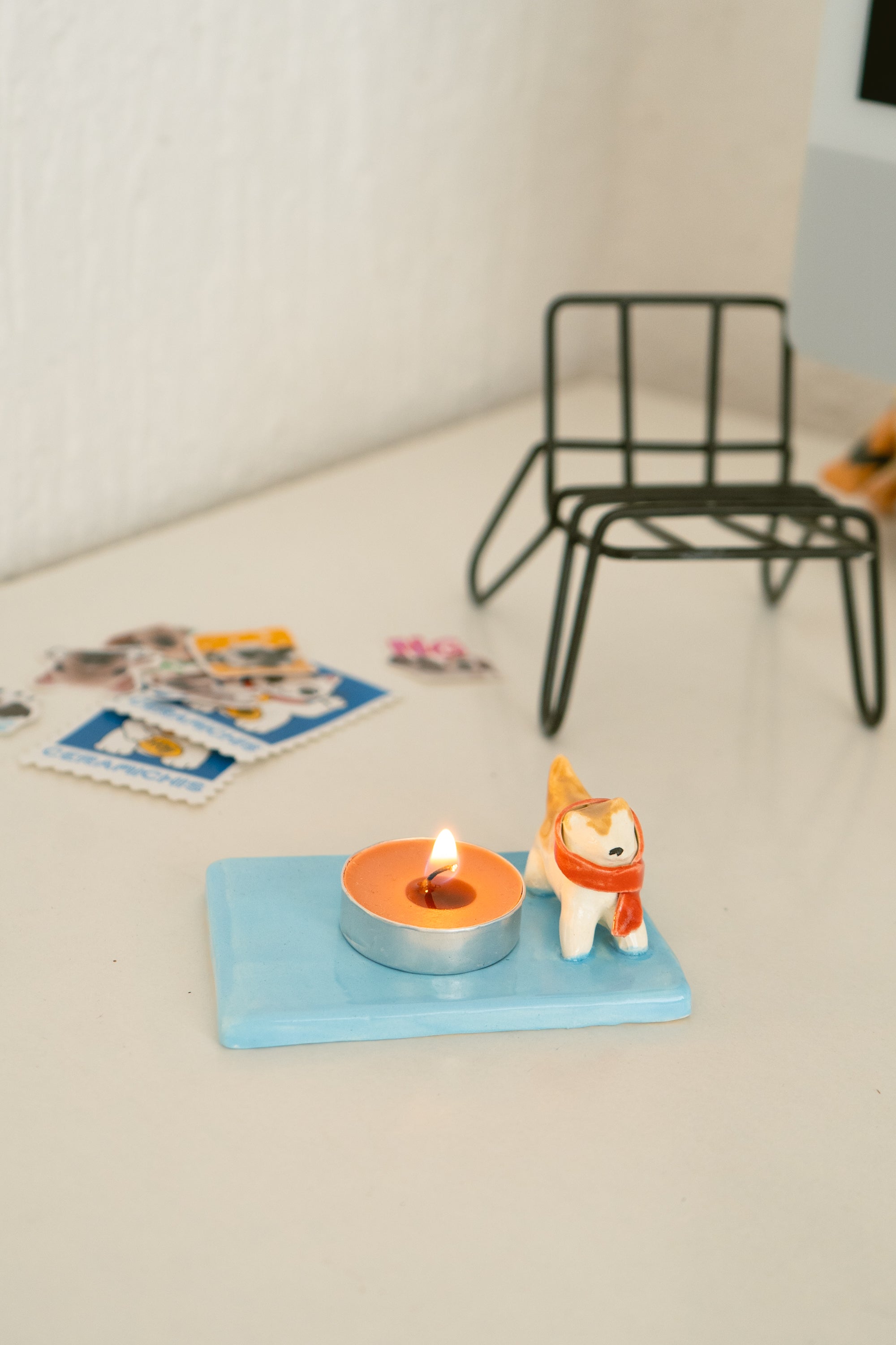 Porta vela de perrito con bufanda