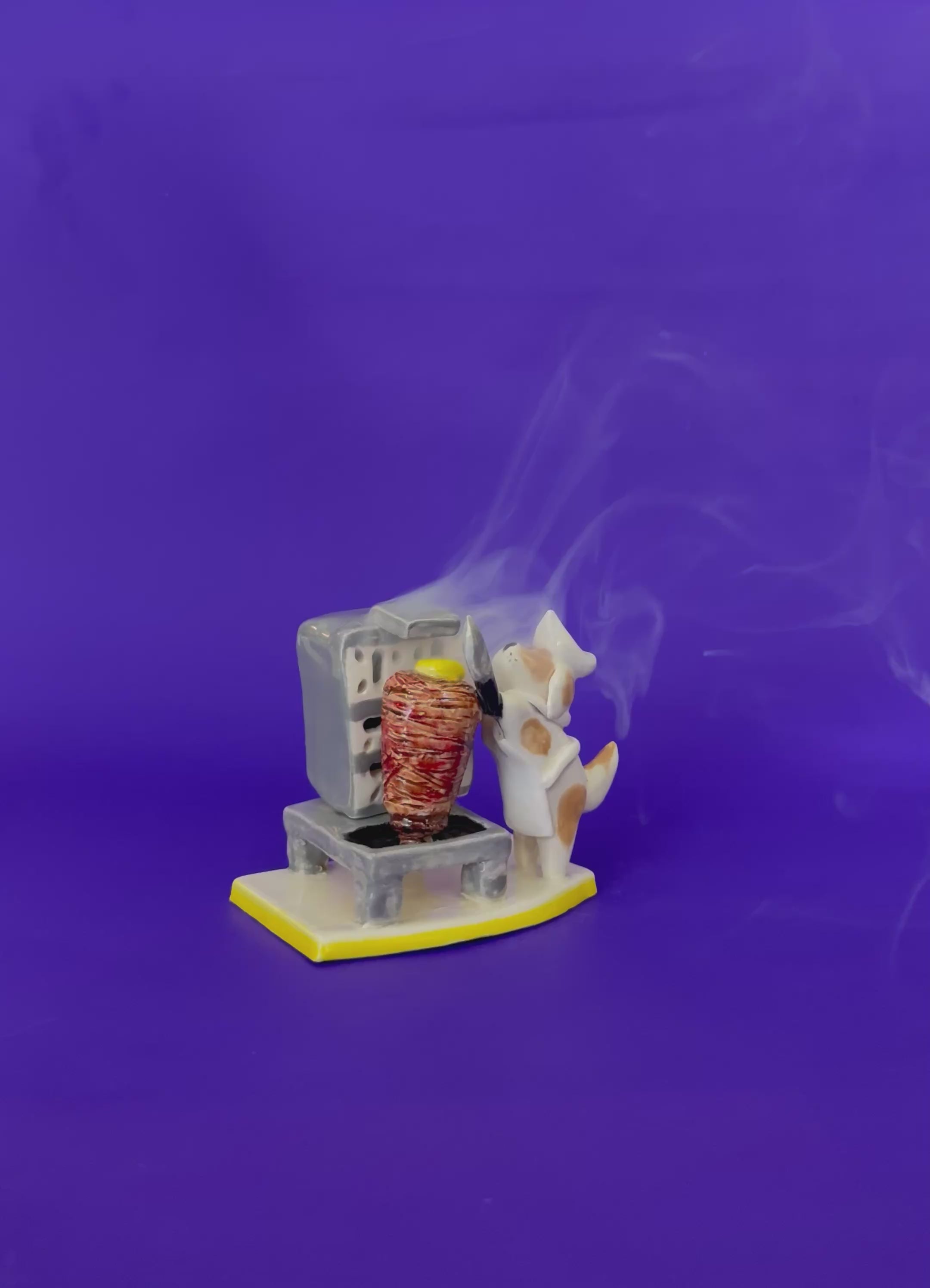Perrito preparando tacos al pastor